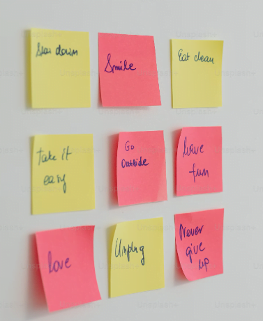 Een Groep Plakbriefjes Met Succesvolle Woorden Erop Geschreven.